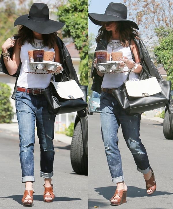 Vanessa Hudgens serves laid-back boho vibes in Studio City, pairing Wildfox boyfriend jeans and See by Chloé espadrille wedges with a Cuore Pelle Caterina bag and oversized fedora
