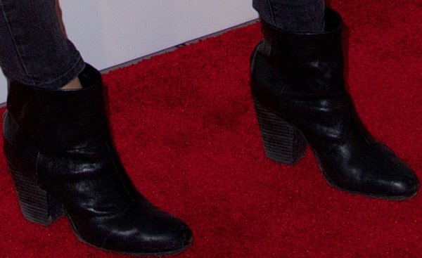 Katie Holmes wearing black leather ankle boots from Rag Bone