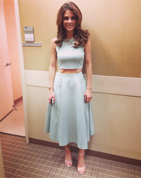 Maria Menounos stuns in a chic mint green two-piece ensemble, pairing a crop top with a matching A-line skirt and Stuart Weitzman Nudist sandals
