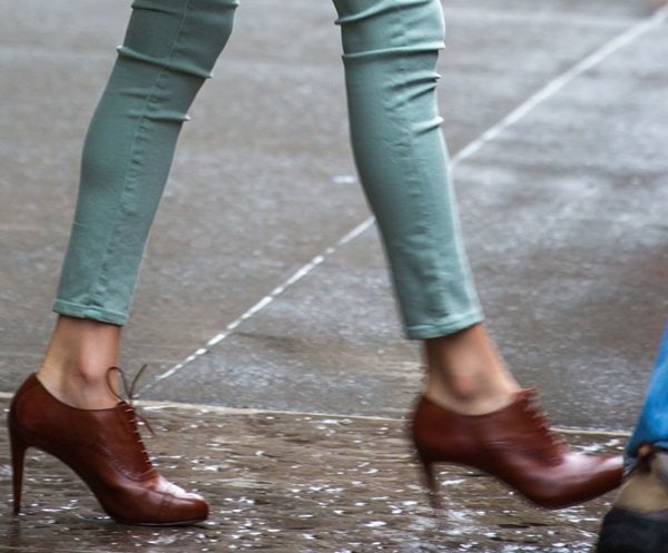Taylor Swift in heeled lace-up oxfords in New York City on April 15, 2014