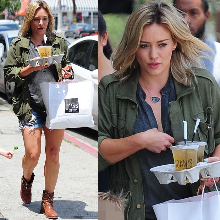 Hilary Duff carries a Joan's on Third takeout bag and a tray of drinks while sporting her chic new haircut in Los Angeles