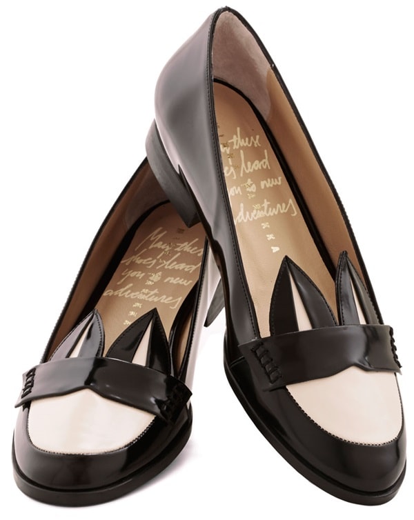Minna Parikka “Hop Couture” loafers elevate classic black-and-cream leather with the designer’s signature playful twist—sculpted bunny ears at the vamp adding a whimsical yet polished finish