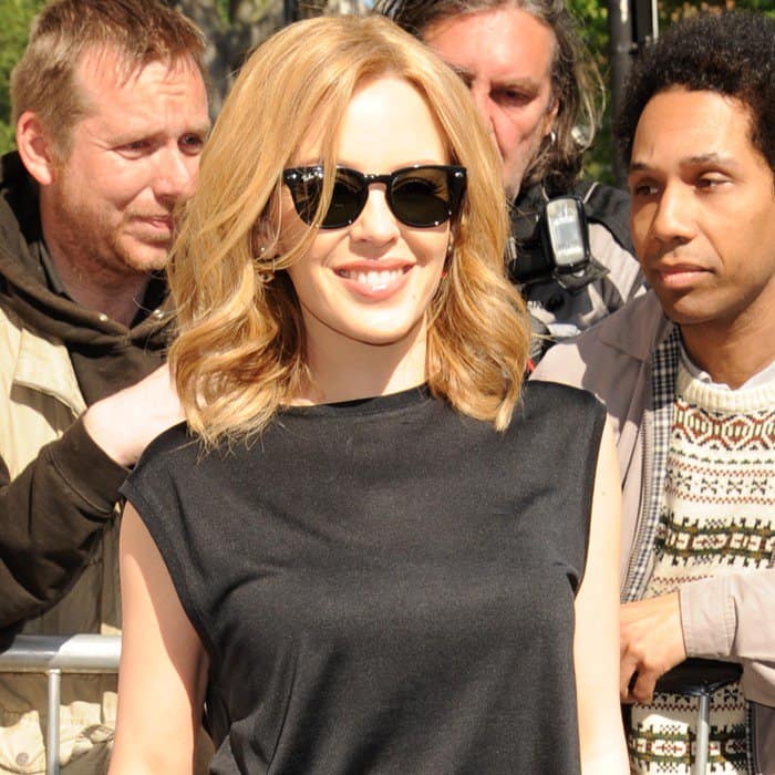 Kylie Minogue capped off the combination with dark sunnies and barely there jewelry