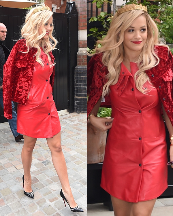 Rita Ora stepping out in a bold red PVC dress, paired with a velvety red jacket and a golden crown