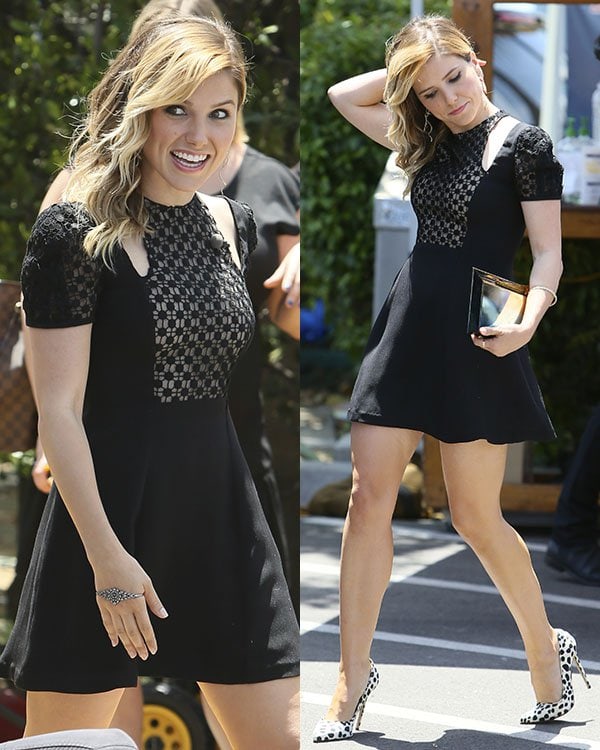 Sophia Bush pairs a black Jill Stuart Spring 2014 dress featuring geometric lace panels and shoulder cutouts with striking Bionda Castana "Daphne" monochrome leopard-print pumps