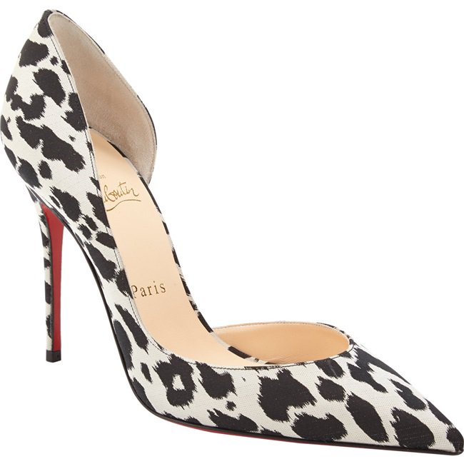 Christian Louboutin's black-and-white "Iriza" pumps combine a flattering low-cut vamp, sharp pointed toe, and signature red sole for a modern take on animal-print stilettos