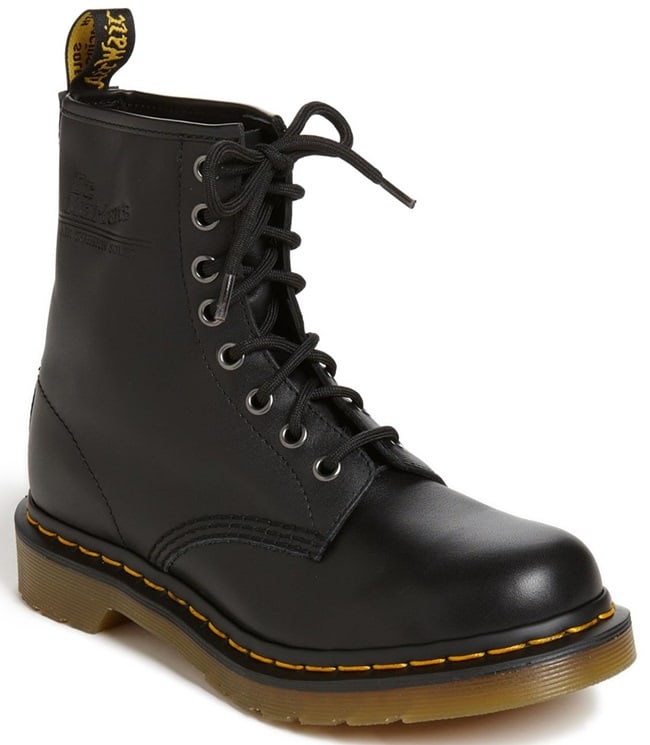 Dr. Martens “1460” 8-Eye Boots in smooth black leather with signature yellow welt stitching and air-cushioned AirWair sole