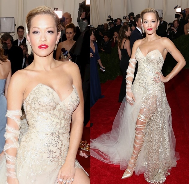 Rita Ora sharpened her sheer, embellished Donna Karan Atelier gown with pointed gold heels, letting the sleek pumps bring structure and polish to the look’s daring, leg-baring silhouette