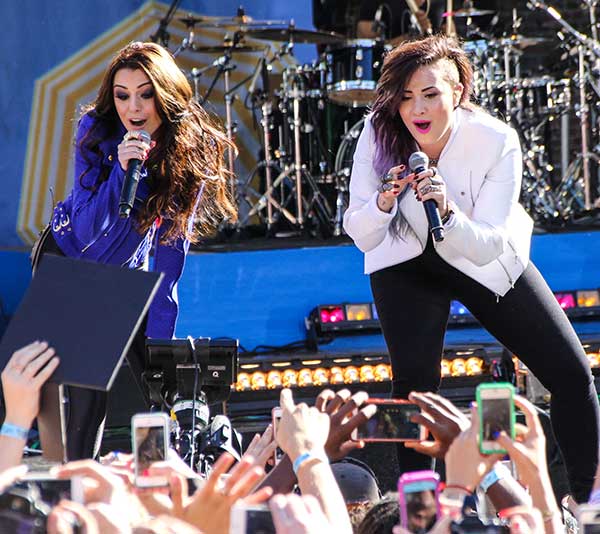 Demi Lovato and Cher Lloyd performing "Really Don't Care" on Good Morning America’s Fun in the Sun Summer Concert Series