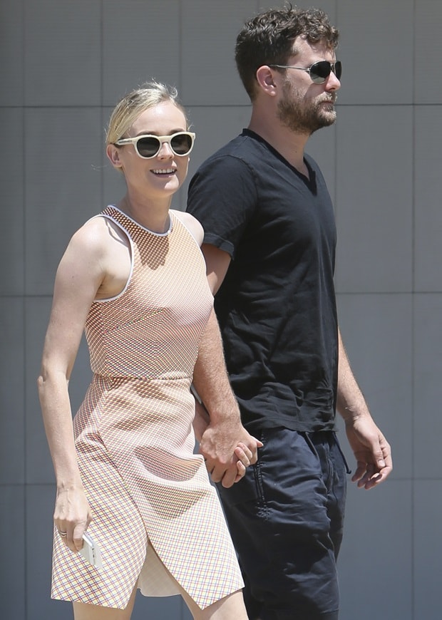 Diane Kruger and Joshua Jackson step out hand-in-hand in Malibu, with Kruger pairing a tailored optic-stripe Dion Lee dress with effortless, festival-inspired edge