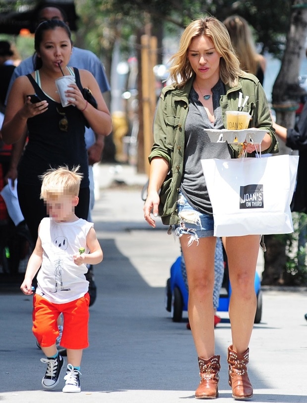 Hilary Duff flaunts her legs in blue distressed denim shorts by Rag Bone