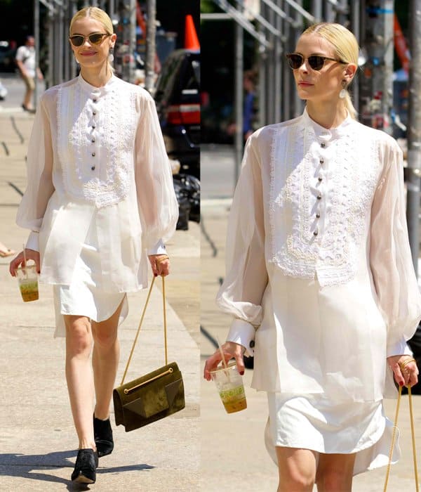 Jaime King showcases a unique white dress with sheer organza sleeves and a layered skirt while out in the East Village, New York City, on June 3, 2014
