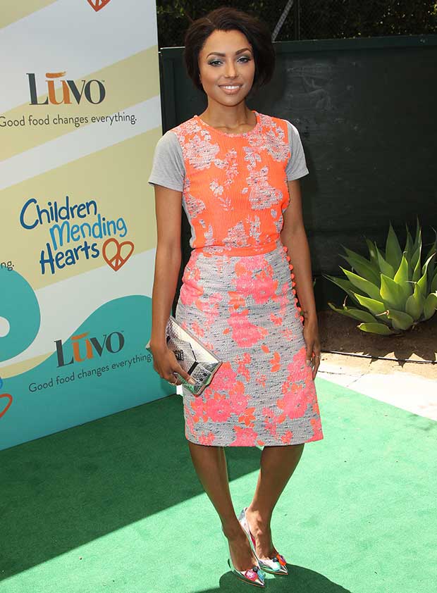 Kat Graham brightens up the green carpet in a color-blocked floral sheath dress paired with metallic Sophia Webster "Lola" pumps featuring crystal-embellished pointed toes