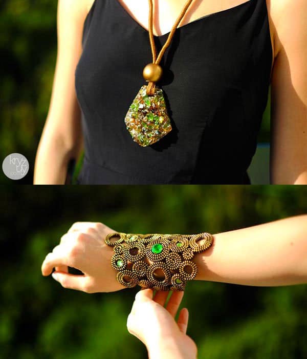 Kryz shows off her crystal-embellished cuff and a stone-encrusted oversized pendant necklace