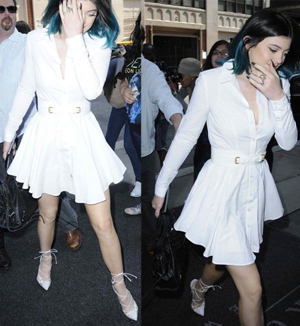 Kylie Jenner looked effortlessly chic in a belted HM shirt dress, paired with Christian Louboutin Impera pumps in white and a Balenciaga City bag in black