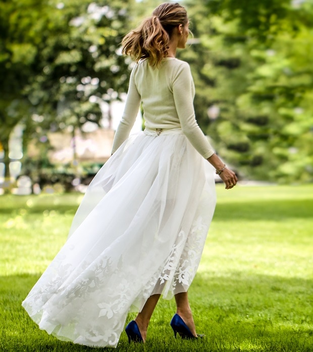 Olivia Palermo's wedding dress consisted of a long-sleeve cashmere sweater and white shorts with a full tulle skirt overlay