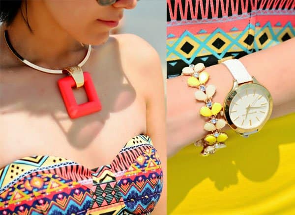 Paris accessorized with a yellow diamond bracelet and a luxurious watch