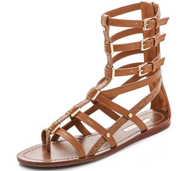 Smooth and croc-embossed leather lends elegant texture to effortless cowhide gladiator sandals