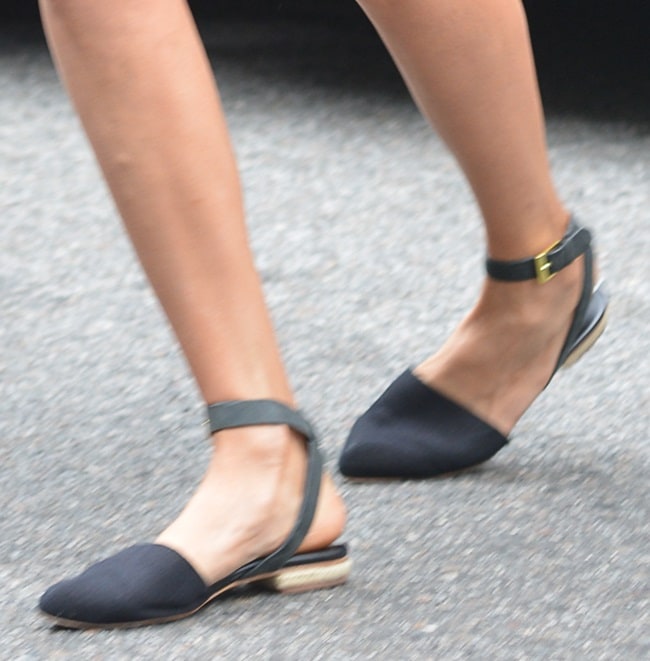 A closer look at Nina Dobrev’s Matt Bernson Cava flats reveals a sharply pointed toe and delicate ankle-wrap straps that refine the casual silhouette