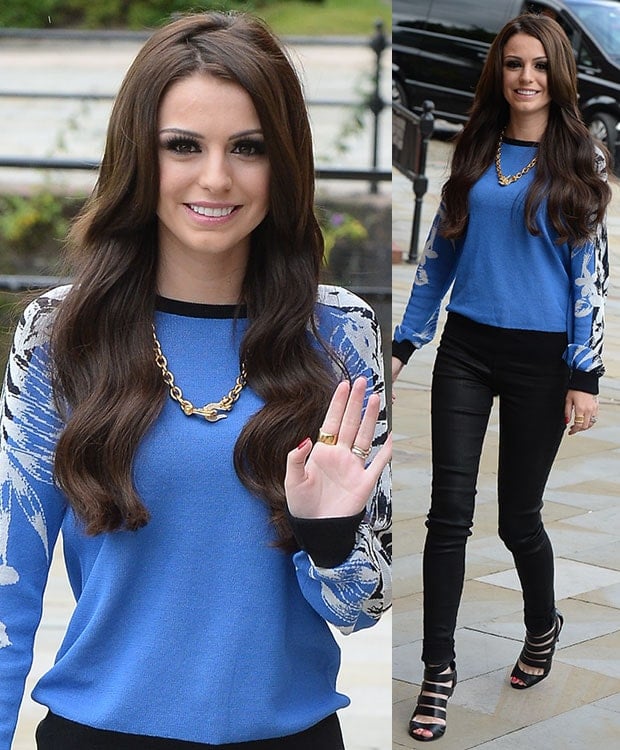 Cher Lloyd brightened her BBC appearance in a cobalt blue printed-sleeve sweater, black skinny pants, and Jimmy Choo’s caged “Damsen” sandals for a sleek, polished finish