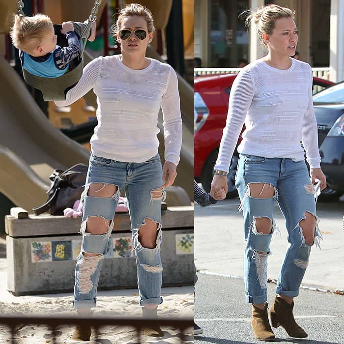 Hilary Duff keeps it casual-chic at a Los Angeles park on November 23, 2014, wearing oversized ripped jeans and tan suede ankle boots while spending time with son Luca