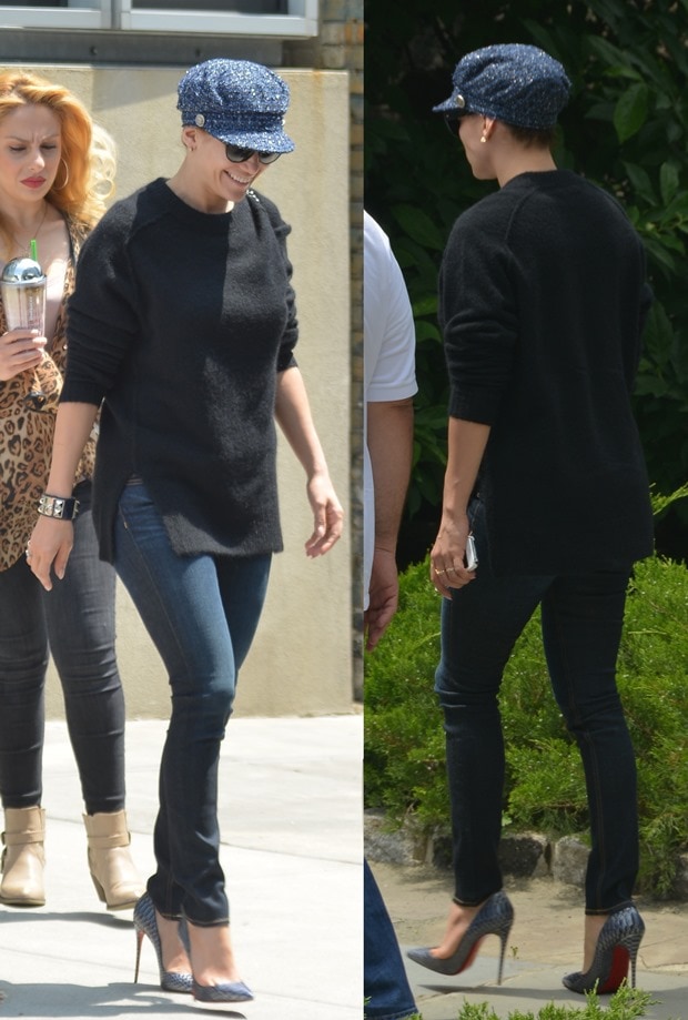 On July 2, 2014, Jennifer Lopez defied the heat in New York City with a glamorous yet casual look, pairing a Chanel newsboy cap and black sweater with her go-to height-boosting secret weapon: Christian Louboutin "So Kate" pumps