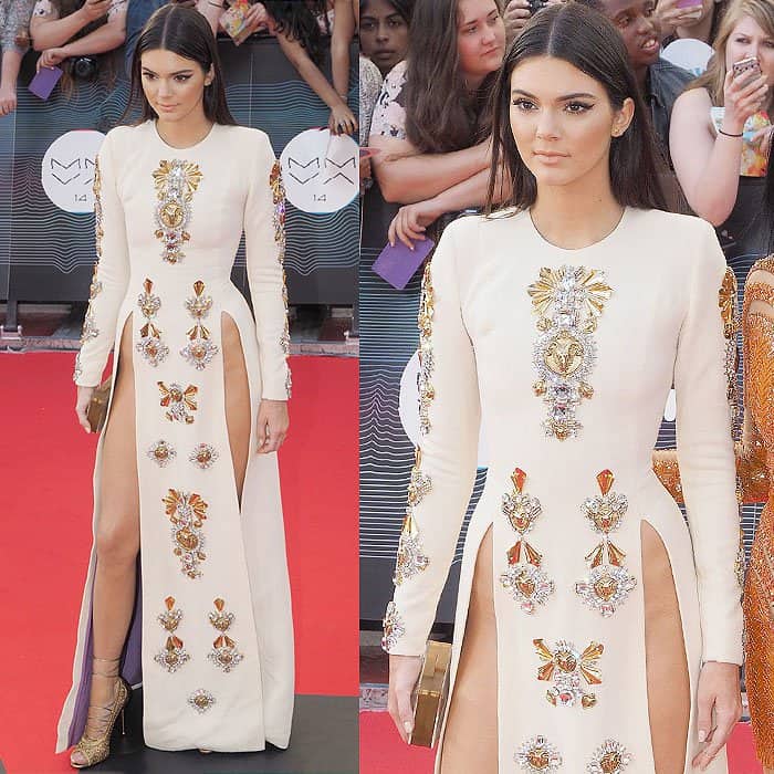 Kendall Jenner made waves at the 2014 MMVAs in a crystal-embellished Fausto Puglisi gown with daring double slits and gold strappy Tom Ford heels at the 2014 MuchMusic Video Awards