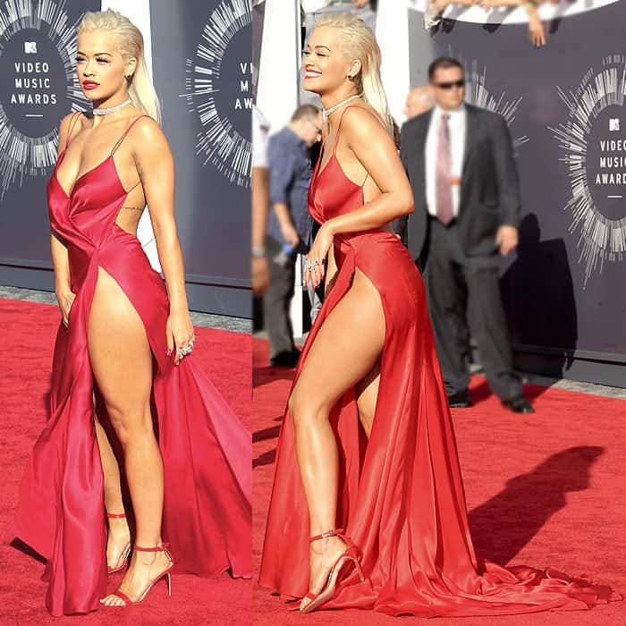 Rita Ora stunned at the 2014 MTV VMAs in a scarlet Donna Karan Atelier gown with a soaring hip-high slit and matching red strappy heels