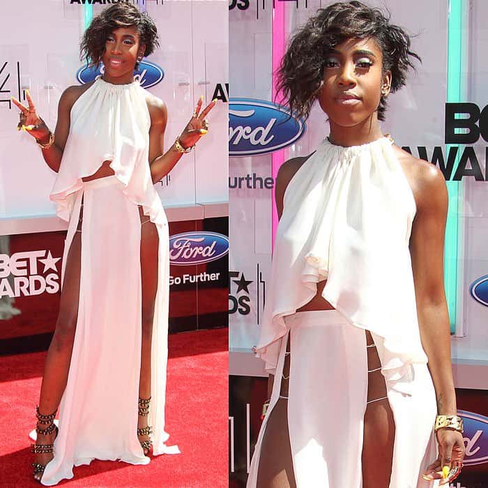Sevyn Streeter stunned at the 2014 BET Awards in a daring white two-piece ensemble with twin waist-high slits and Giuseppe Zanotti gold-rivet sandals