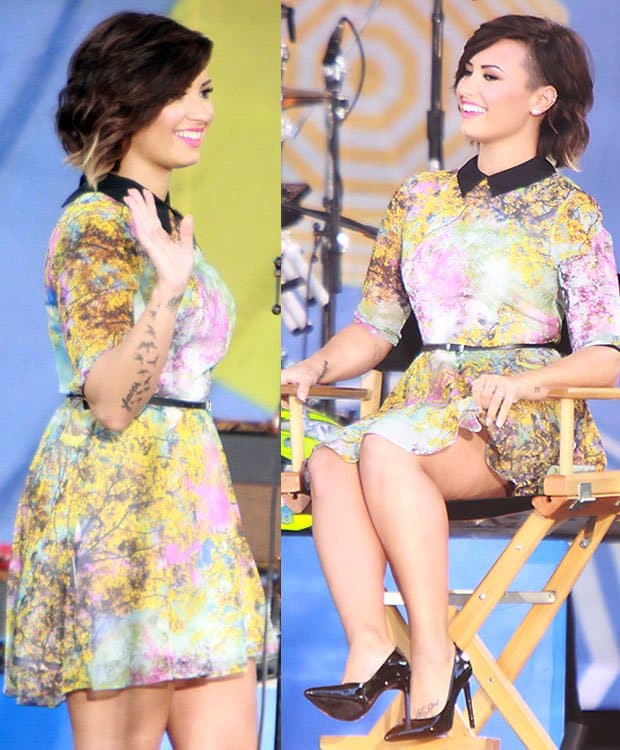 Demi Lovato rocks a chic half-shaved ombre hairstyle and a dreamy pastel Ted Baker “Pretty Trees” dress featuring bird and floral prints, a black collar, and a matching belt