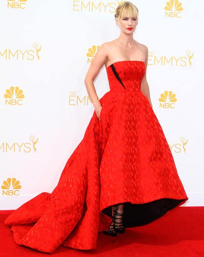 January Jones turns heads in a dramatic red Prabal Gurung dress with a high-low hem at the 66th Primetime Emmy Awards