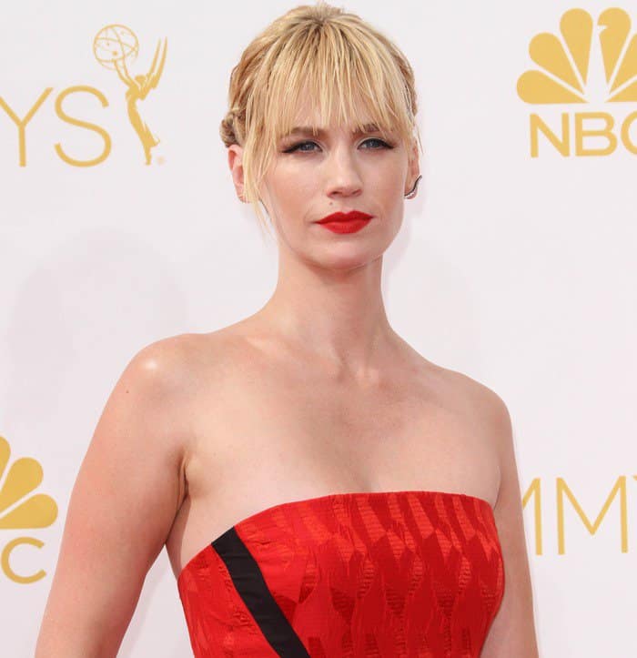 January Jones stuns in a bold red Prabal Gurung dress with a high-low hem at the 66th Primetime Emmy Awards