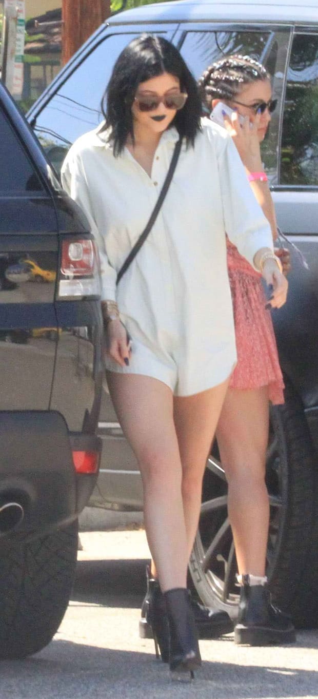 Kylie Jenner steps out in West Hollywood with bold black lipstick and sleek, dark hair, making a striking beauty statement