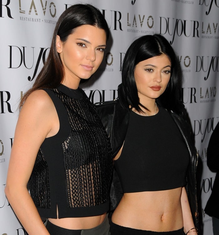 Kendall and Kylie Jenner stick together on the red carpet at DuJour Mag Fall 2014 Cover Party held at LAVO in New York City on August 28, 2014