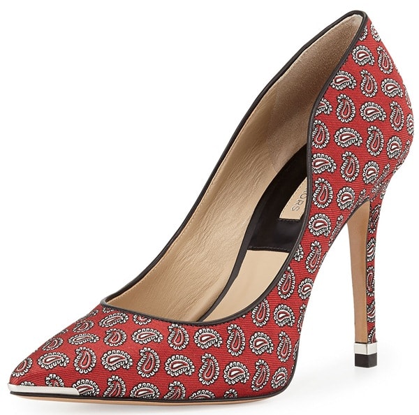 Michael Kors “Avra” Paisley Pumps in Red — A bold red paisley-print pump with a sharp pointed toe and slim stiletto heel, accented by a polished metal toe tip for a modern edge