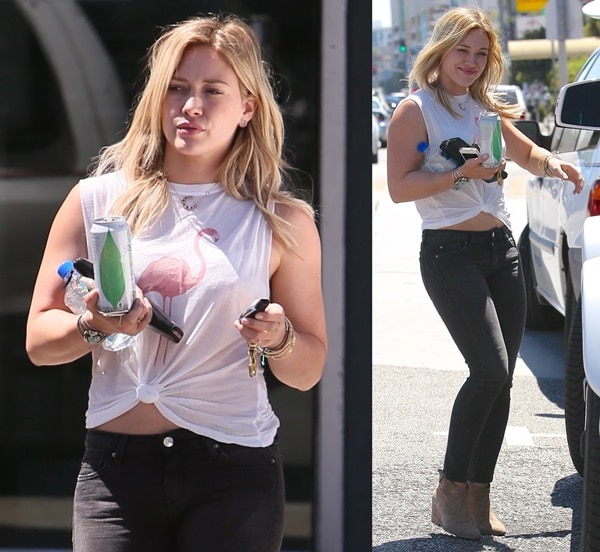 Hilary Duff paired the chic boots with a low-key look that included a white tee and black skinny jeans