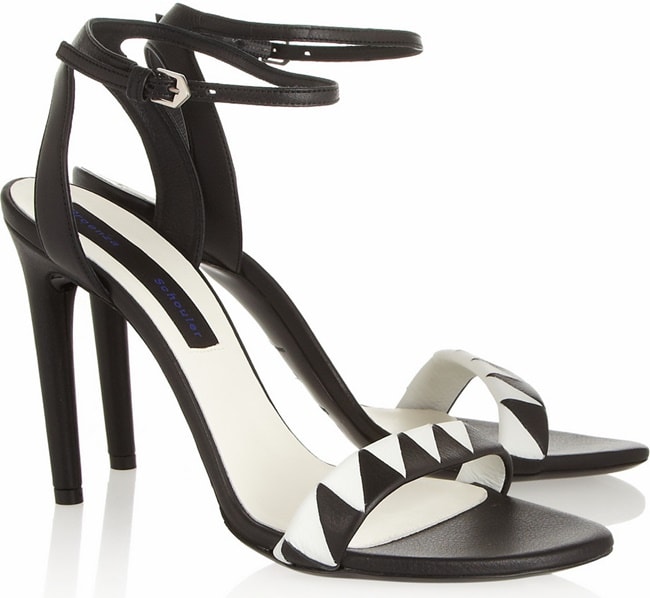 Proenza Schouler two-tone leather ankle-strap sandals feature a sharp graphic zigzag motif across the vamp, balanced by slim stiletto heels and a minimalist ankle buckle that keeps the bold pattern feeling polished rather than overpowering