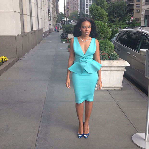 Angela Simmons' long black curls were elegantly draped over her shoulders