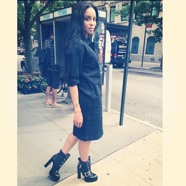 Ciara masters urban chic in a denim shirtdress paired with bold Alexander McQueen biker boots, blending effortless cool with edgy vibes