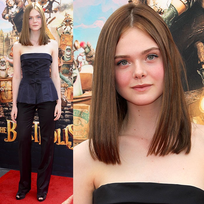 Elle Fanning not only dyed her hair a brown chestnut color but also bravely chopped it off to shoulder length