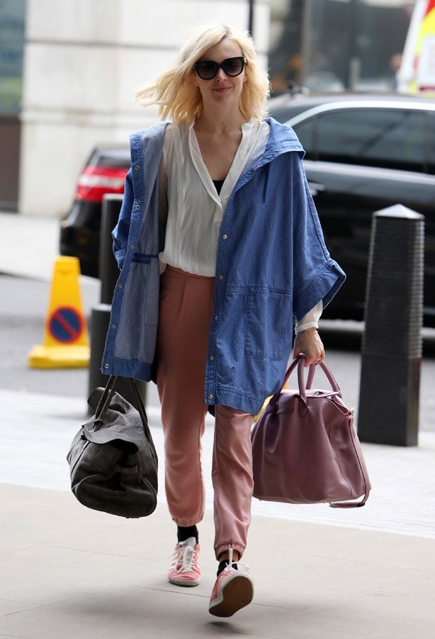 Fearne Cotton nails casual-chic in an oversized denim jacket, a breezy blouse, and slouchy pink pants, effortlessly pairing them with sporty sneakers outside BBC Radio 1 in London on April 29, 2014