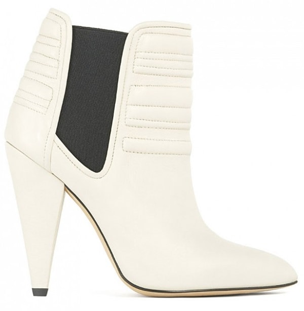 The IRO “Klara” ankle boots in white combine smooth leather, quilted ankle panels, and a tapered stiletto heel for a modern Parisian rock-chic finish