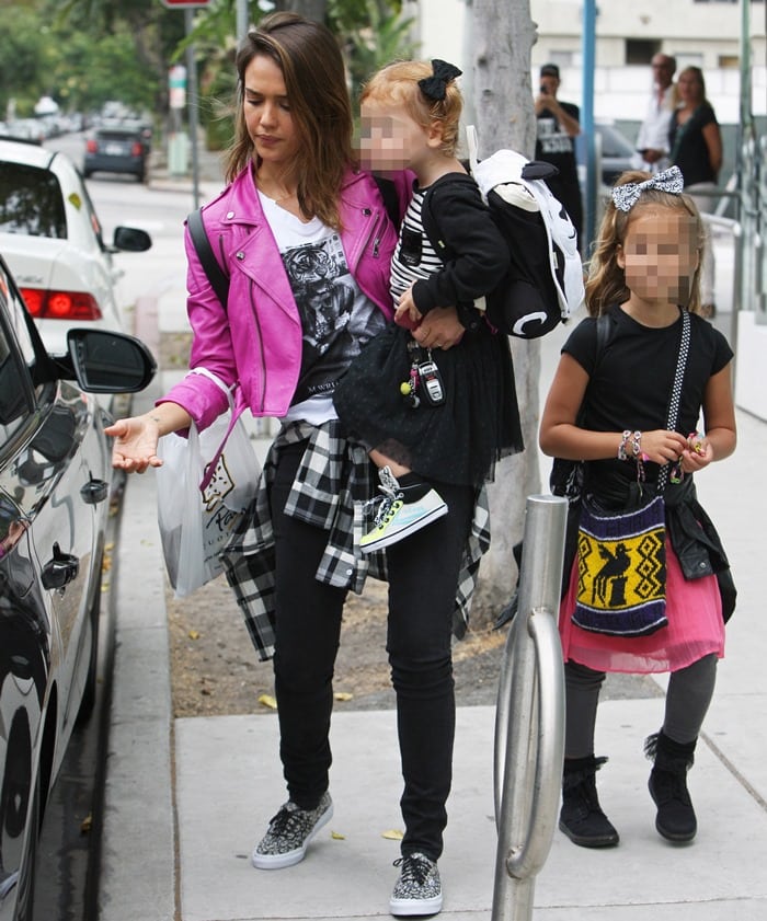 Jessica Alba wearing a pink Hyacinth lambskin jacket from the Ralph Lauren Collection