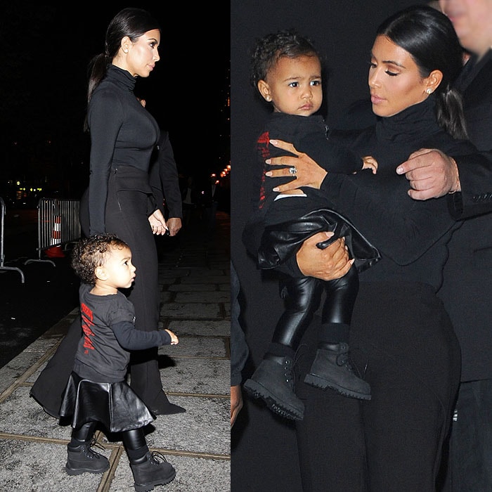 Kim Kardashian arrives at the Balenciaga Spring/Summer 2015 show in Paris carrying North West, whose rugged toddler Timberland boots contrast with her mother’s sleek pointed pumps