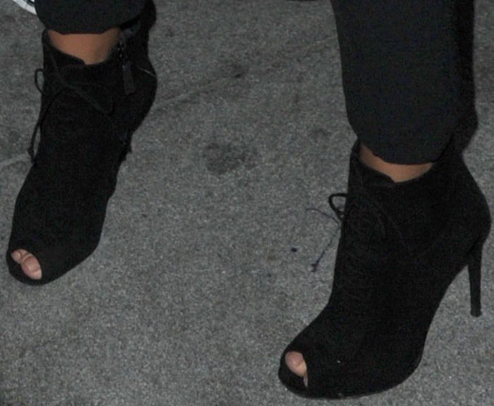 Kim Kardashian completes her monochrome look with sleek black Tom Ford peep-toe booties