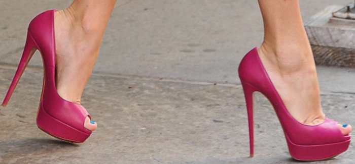 Taylor Swift in pink Lady Peep pumps by Christian Louboutin