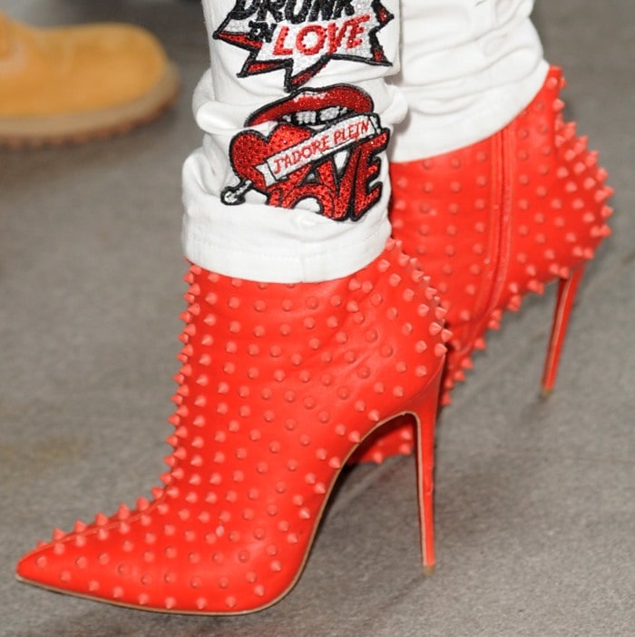 Rita Ora in red studded Christian Louboutin Snakilta booties