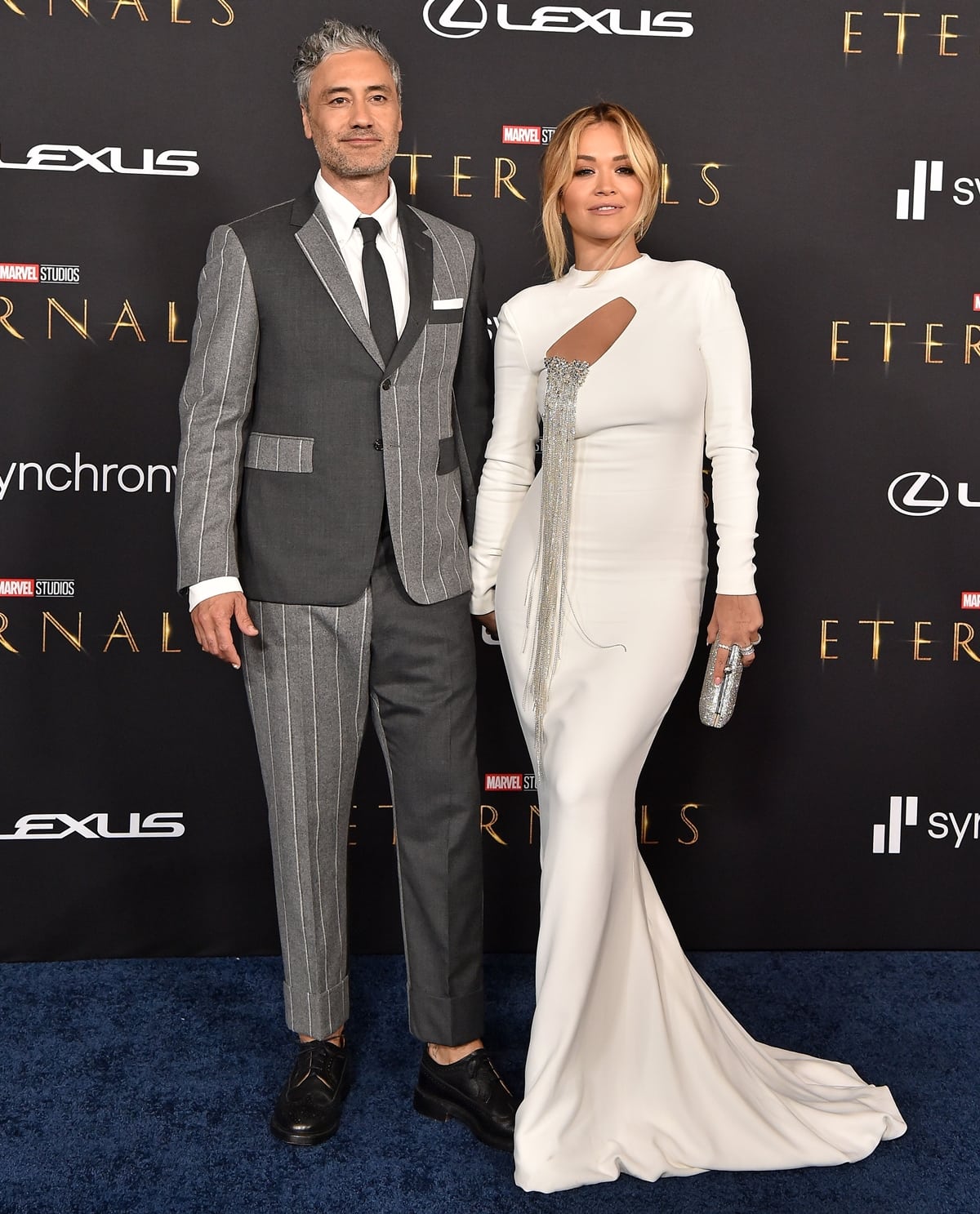 Rita Ora exuded modern elegance at the Eternals premiere in a sculptural Stéphane Rolland gown, finishing the sleek silhouette with minimalist heels that kept the focus on the dress’s crystal-embellished cutout detail