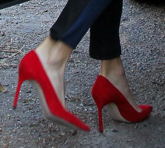 Nikki Reed wearing red hot stilettos