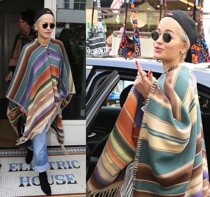 Sporting a bold striped poncho and black pointy suede booties, Rita Ora arrived at Electric Cafe in Notting Hill, London, on September 17, 2014